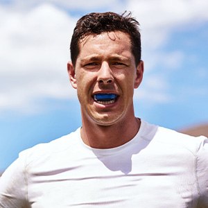 Man wears mouthguard