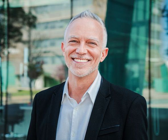 Portrait of confident, smiling senior man