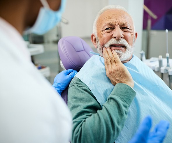 A man with a failing dental implant